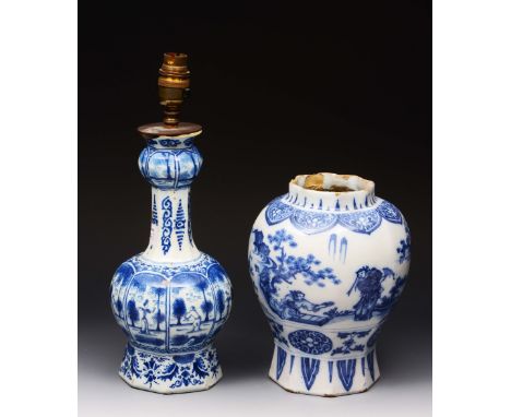 A DUTCH DELFT BLUE AND WHITE GLOBULAR BOTTLE VASE with garlic neck and figure decoration with lamp fitment, 26.5cm high; and 