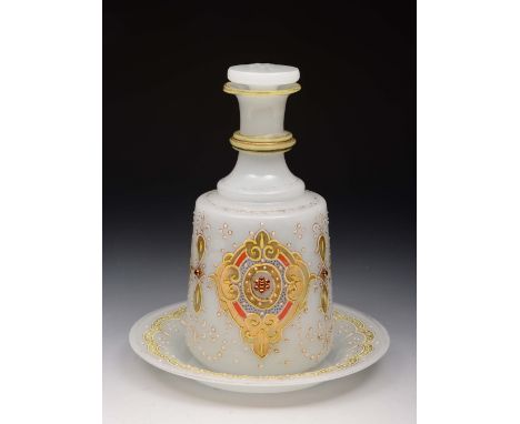 A FRENCH OPAQUE GLASS DECANTER AND STOPPER on circular stand with enamelled decoration, 21cm high