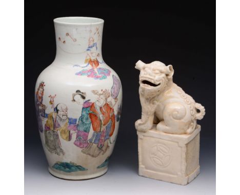A CHINESE PORCELAIN TAPERING VASE with polychrome figure decoration, 40cm high; and a Chinese ceramic dog of fo on plinth, 30