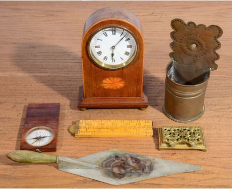 A SMALL EDWARDIAN MANTEL CLOCK with inlaid decoration and white enamel dial, 22cm high; a desk compass in rosewood case; a fo