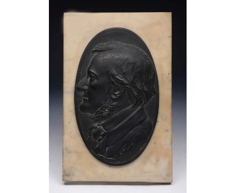 AN OVAL METAL SILHOUETTE PORTRAIT of a bearded gentleman with top coat and cravat set on a marble plinth, 55 x 15cm