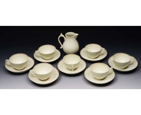 AN 18TH CENTURY WORCESTER PART TEA SERVICE consisting of seven cups and saucers and a sparrow beak cream jug of plain reeded 