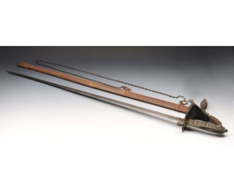 A VICTORIAN OFFICERS DRESS SWORD with engraved steel blade and Royal Cypher metal scabbard