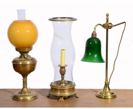 A BRASS STUDENTS LAMP, height adjustable with green glass shade, 52cm high; a brass oil lamp converted to electricity, 54cm h