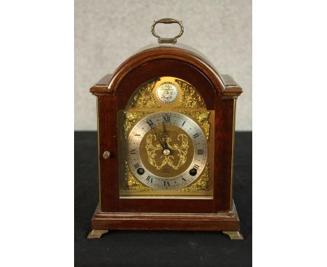 A late 20th century mahogany cased Tempus Fugit dome topped mantle clock, the brass and silvered dial with black Roman numera