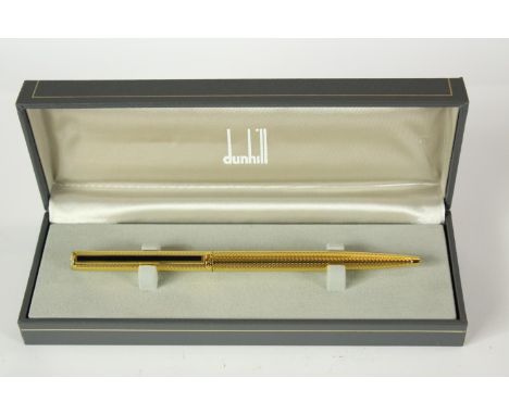 A mid 20th century boxed gold plated Dunhill rollerball pen. H.6 W.17.5 D.4cm. (box) 