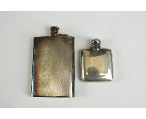 An Elizabeth II hallmarked silver engine turned hipflask, Mappin &amp; Webb Birmingham 1983, 16cm long, 226g gross weight tog