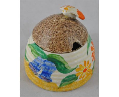 Clarice Cliff for Newport Pottery, a small Canterbury Bells beehive honey pot, Bizarre mark, 7.5cm high