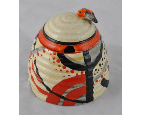 Clarice Cliff for Newport Pottery, a Red Carpet beehive honey pot, Bizarre mark, 9cm high