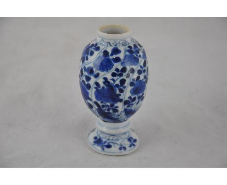 A miniature Chinese blue and white vase, Ching dynasty, early 18th century Kangxi period. Height&nbsp;11cm. Condition: vase h