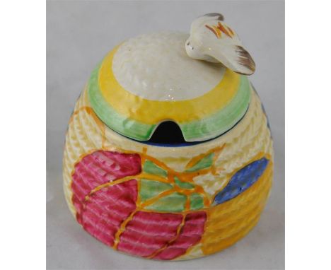 Clarice Cliff for Newport Pottery, a small Pastel Melon beehive honey pot, Fantasque Bizarre marks, 7.5cm high CONDITION: Sta