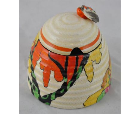 Clarice Cliff for Newport Pottery, a Honolulu beehive honey pot, Fantasque Bizarre marks, 9cm high   CONDITION: Staining to l