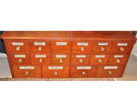 A mahogany apothecary cabinet, fitted with sixteen drawers each with chemist specimens to include R Clycyr, R Zincib, Resin F