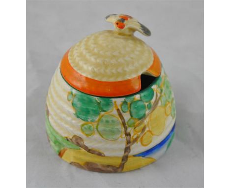 Clarice Cliff for Wilkinson, a small Secrets beehive honey pot, Bizarre mark, 7.5cm high
