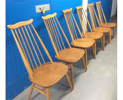 A set of modern design Ercol blonde Elm spindle back chairs.&nbsp;