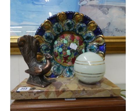 A French Art Deco peacock decorated table lamp on marble base and a multi coloured plate 