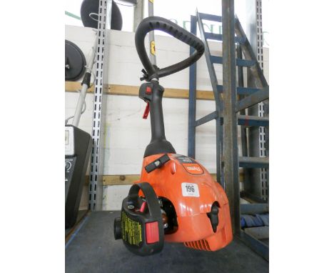 A Flymo petrol engine strimmer 