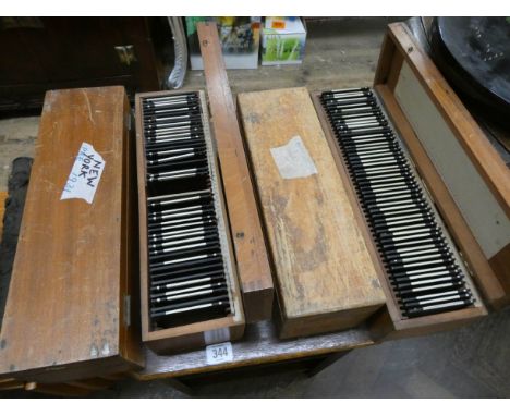 Four boxes of magic lantern slides to include New York, Steam Trains etc 
