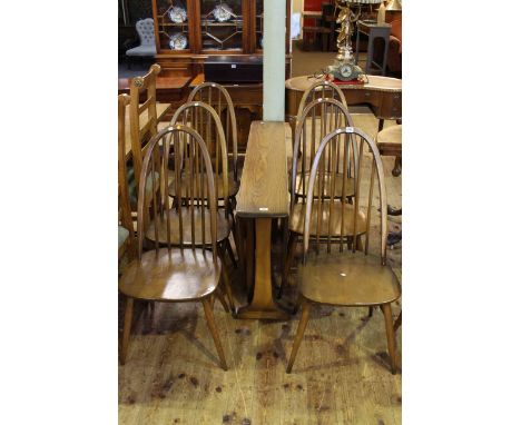 Ercol drop leaf dining table and six quaker back chairs