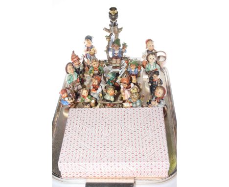 Sixteen Hummel figures, Hummel lamp and stationery set