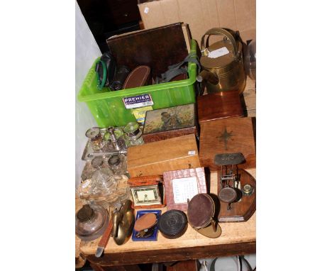 Brass watering can, binoculars, cameras, boxed compass, travelling clock and calendar, postal scales, inkwells, etc