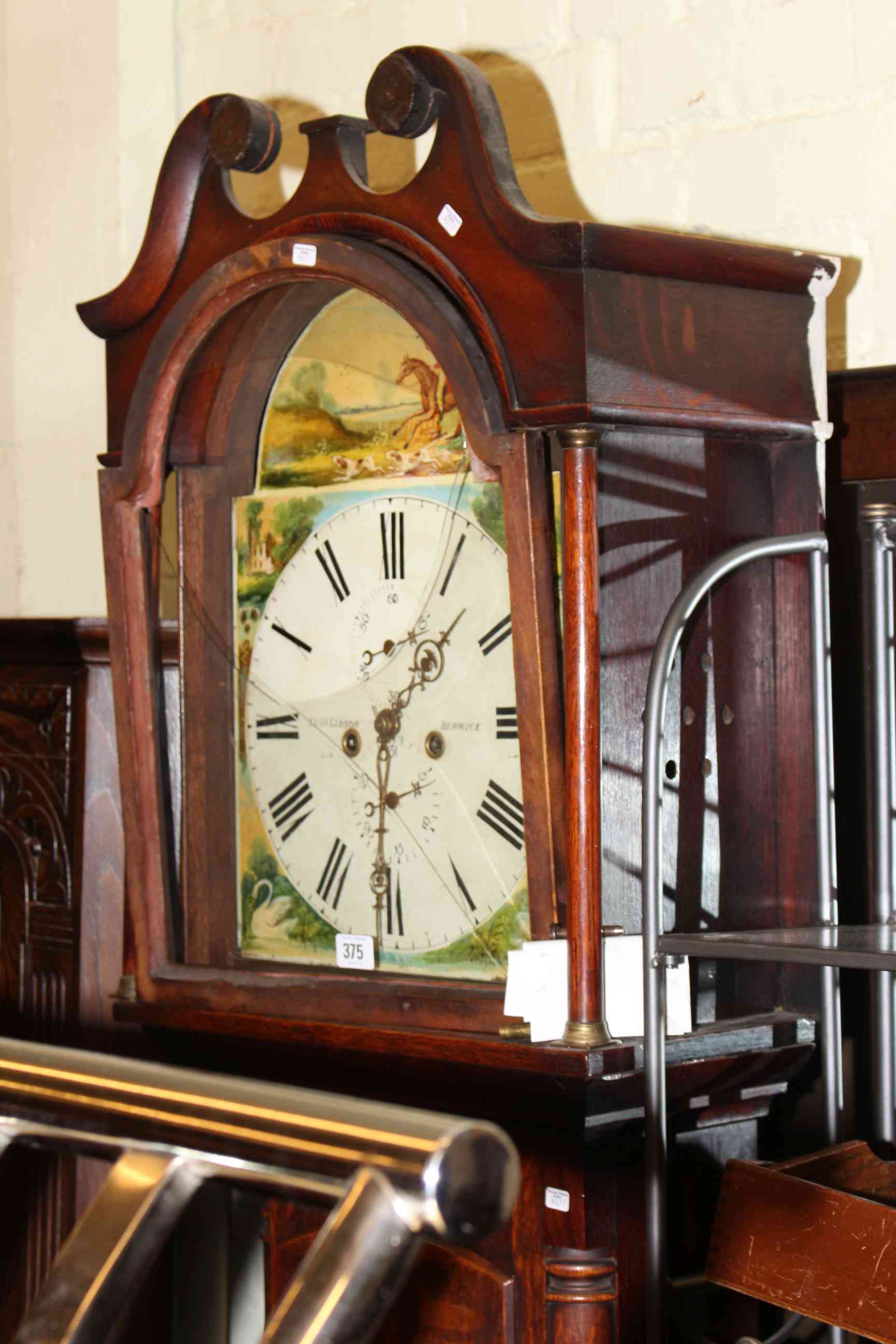 Antique oak eight day longcase clock having painted arched dial, Thos ...