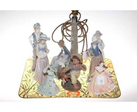 Collection of figures including Nao, Lladro and Royal Worcester