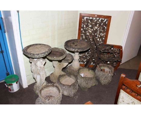 Four naturalistic tree trunk planters, three bird baths, patio table and two chairs (10)