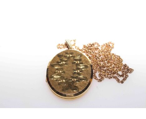 9 carat gold pendant locket, on a chain with clasp stamped 9CT, gross 25 grams