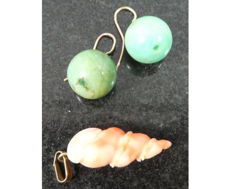 A Carved Red Coral Pendant in the Form of a Shell together with a Pair of Jade Drop Earrings 
