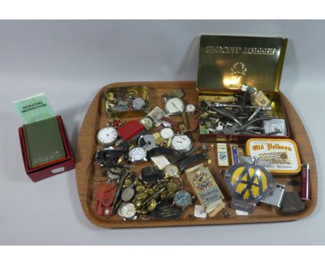 A Tray of Curios to Include AA Badge, Cigarette Cards, Cigarette Lighters, Military Buttons, Novelty Table Lighter in the For