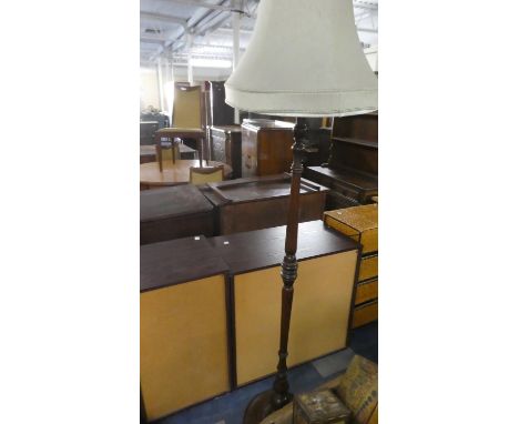 An Edwardian Turned Oak Standard Lamp and shade 