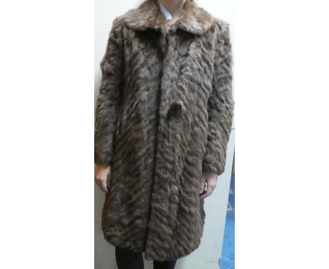 A Vintage Ladies Fur Coat 