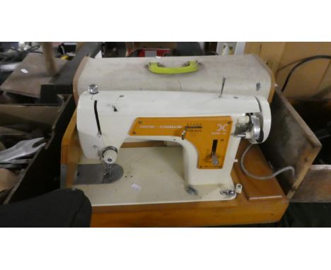 A Vintage Frister and Rossmann Electric Sewing Machine 