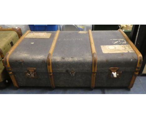A Vintage Canvas and Wooden Covered Travelling Trunk with Labels for Calcutta, 90cms Wide 
