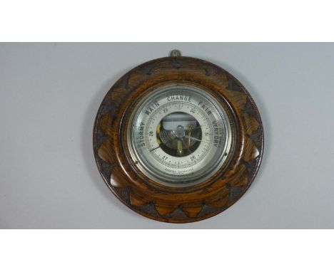 An Edwardian Carved Oak Circular Aneroid Barometer, Glass Cracked, 20cms Diameter 