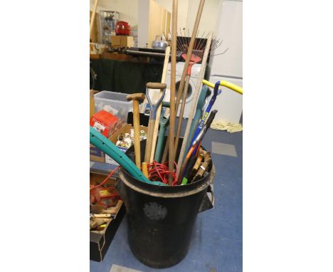 A Plastic Bin Containing Garden Tools 