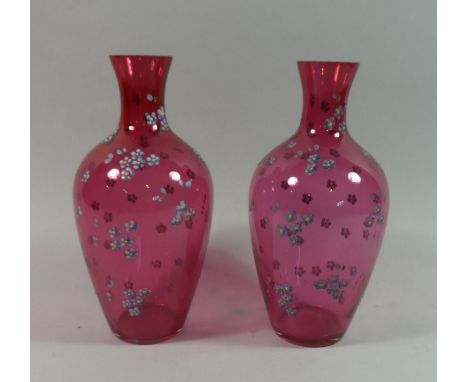 A Pair of Floral Enamel Decorated Cranberry Glass Vases, Each 23cms High 