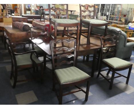 A 19th Century Mahogany Drop leaf Dining Table and Set of Eight Pierced Ladder Back Dining Chairs to Include Two Carvers 