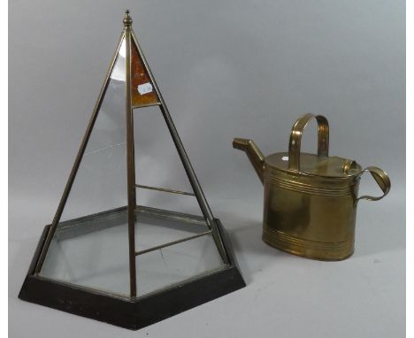 A Hexagonal Terrarium Stand of Architectural Form together with an Army and Navy Brass Watering Can 