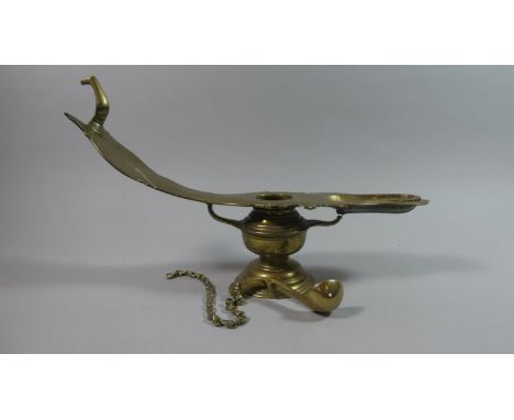 A Late 19th/Early 20th Century Egyptian Oil Lamp and Ladle 