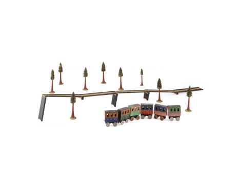 ERZGEBIRGE PAINTED WOOD MODEL TRAIN SET  MID-19TH CENTURY   comprising six carriages on wheels, with passengers; nine trees, 