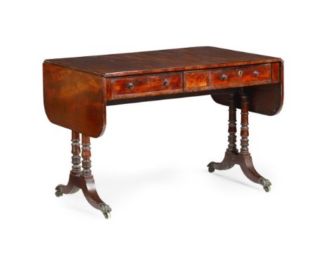 REGENCY MAHOGANY AND EBONY SOFA TABLE  EARLY 19TH CENTURY   the rounded rectangular top with drop ends over a pair of short f