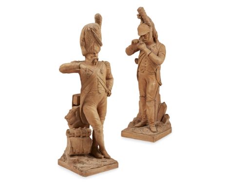 TWO VICTORIAN TERRACOTTA FIGURES OF SOLDIERS  19TH CENTURY   each depicted in uniform with accessories, the first tamping his