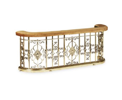 VICTORIAN BRASS CLUB FENDER  LATE 19TH CENTURY   the D shaped padded cushion top in light brown plush, above openwork scrolli