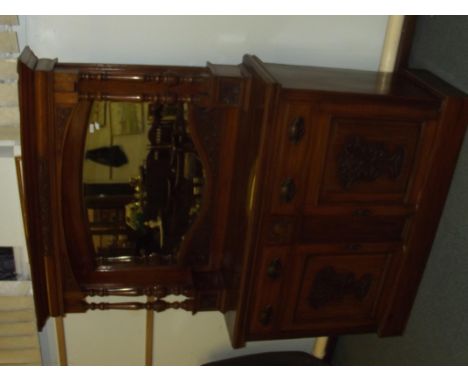 Late Victorian sideboard, upper section with central bevel edged mirror flanked by four turned supports , lower section with 