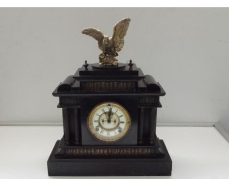 Victorian slate mantel clock, architectural form, the pediment and base depicting Roman figures , reeded columns, white ename