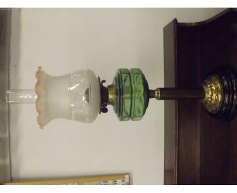 Victorian oil lamp with green reservoir 