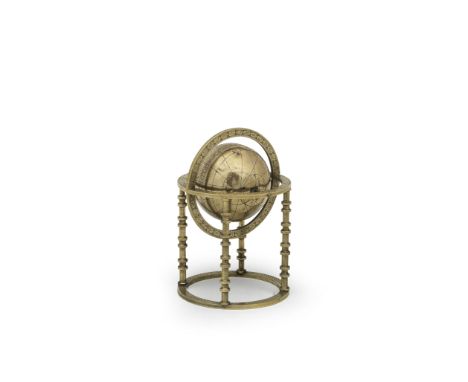 A late Zand or early Qajar brass celestial globe Persia, 18th Centurythe brass sphere mounted with axle running through poles