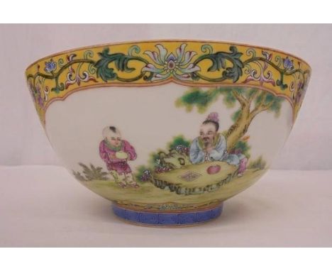 C20th Chinese Bowl with yellow ground, panels Famille rose enamels, young boy fishing with lady attendant & man playing chequ